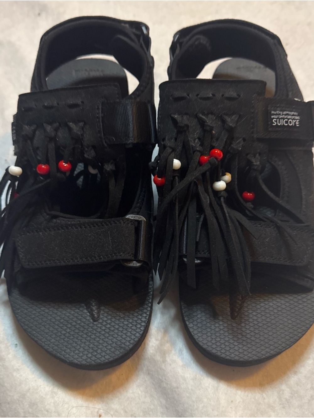 Suicoke Black Fringe Sandals with Red & White Bead Accents